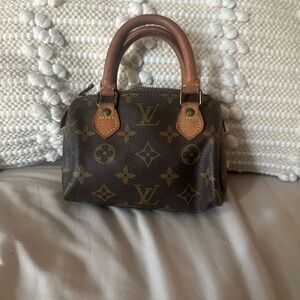 Authentic Louis Vuitton nano speedy crossbody.